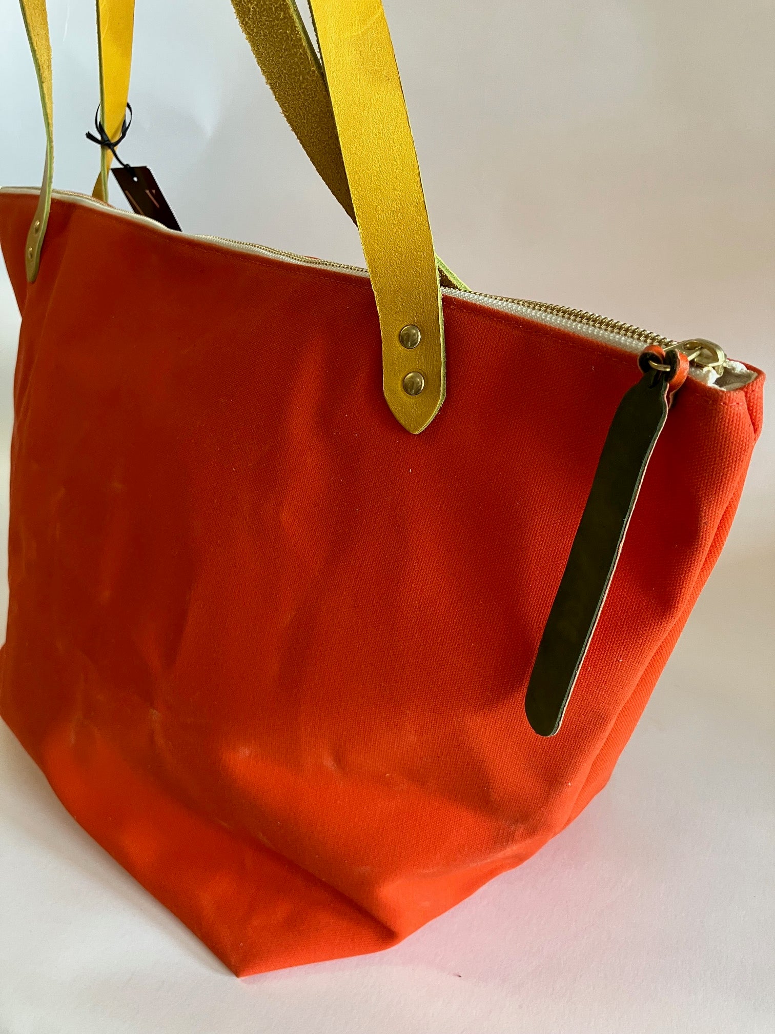 One of a kind Travel bag in neon orange waxed canvas FRONTENAC