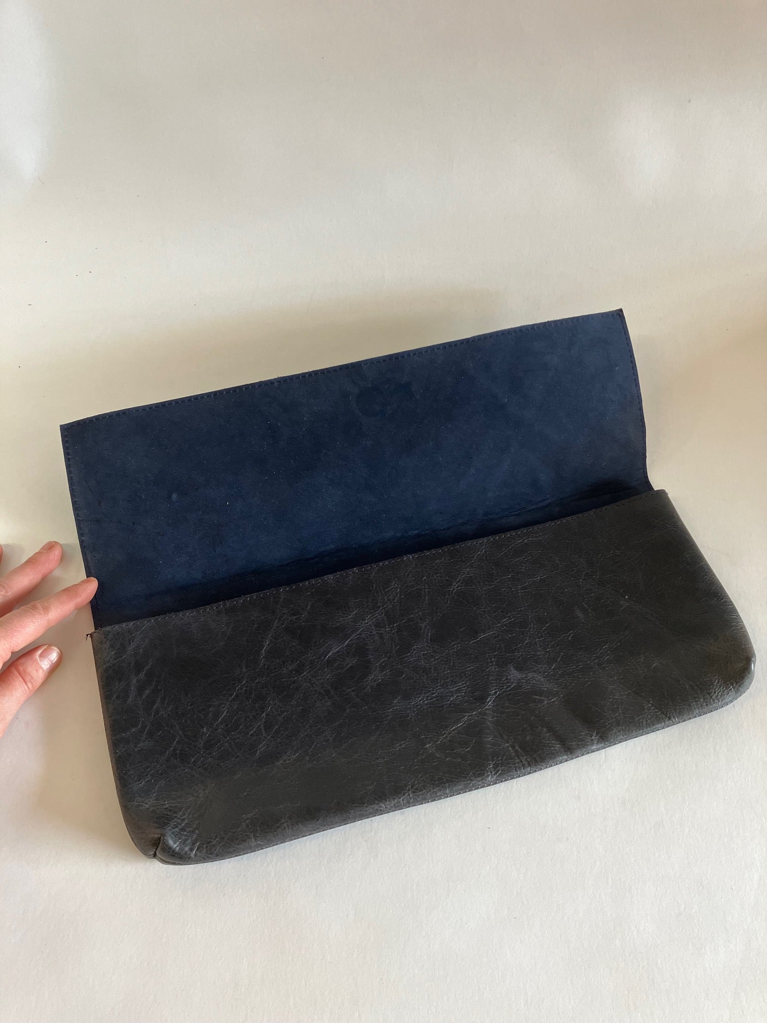 ONE OF A KIND - SAMPLE Leather clutch bag, baguette bag in midnight blue