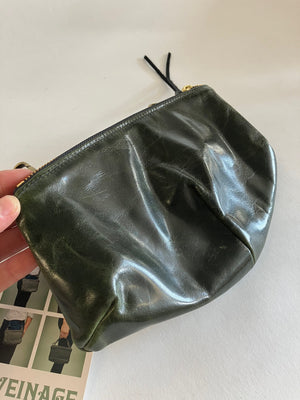 ÉCHANTILLON. Sac banane en cuir. pochette detaille pour pantalons