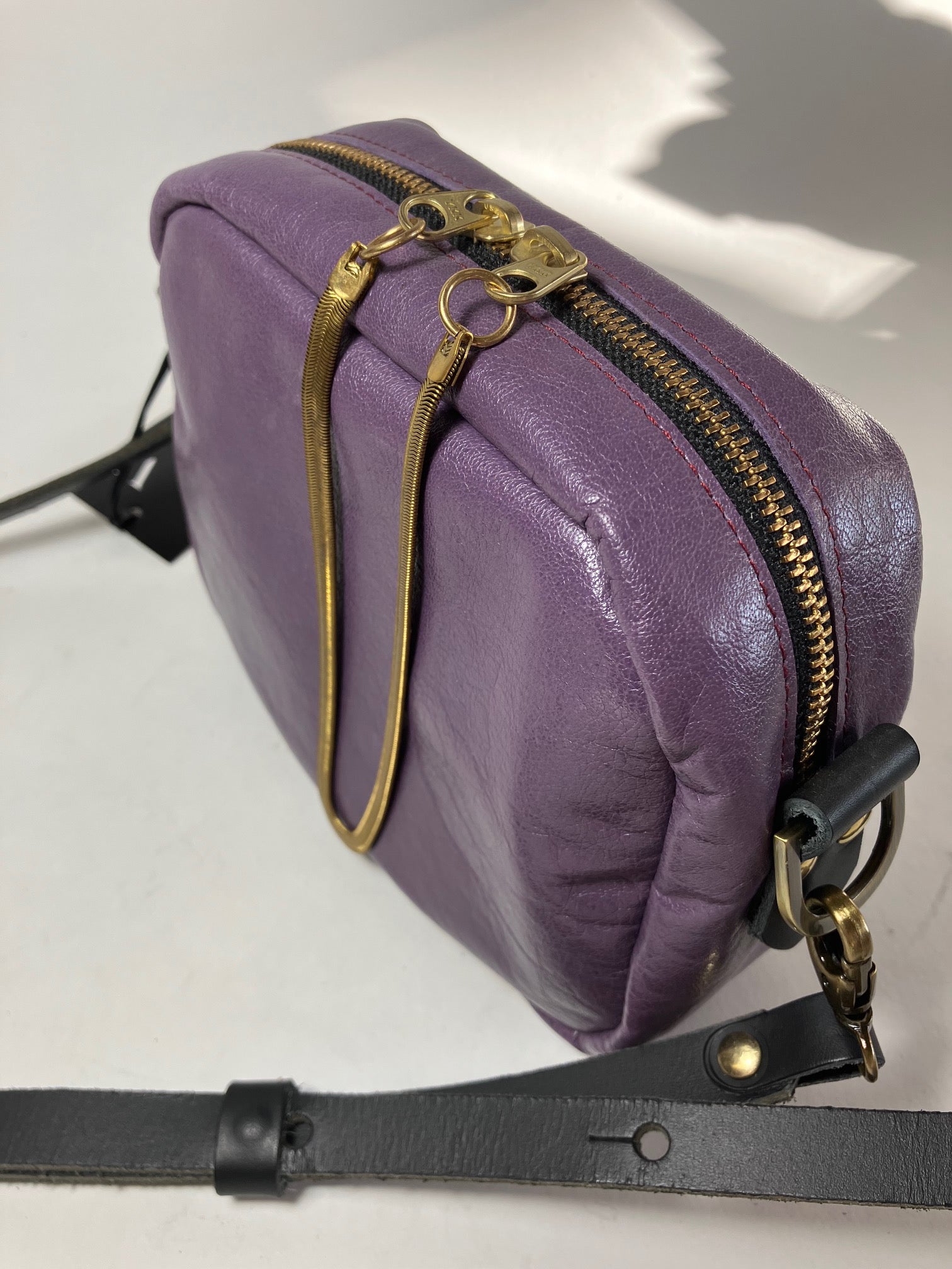 SAMPLE Leather crossbody bag and brass charm orchid color