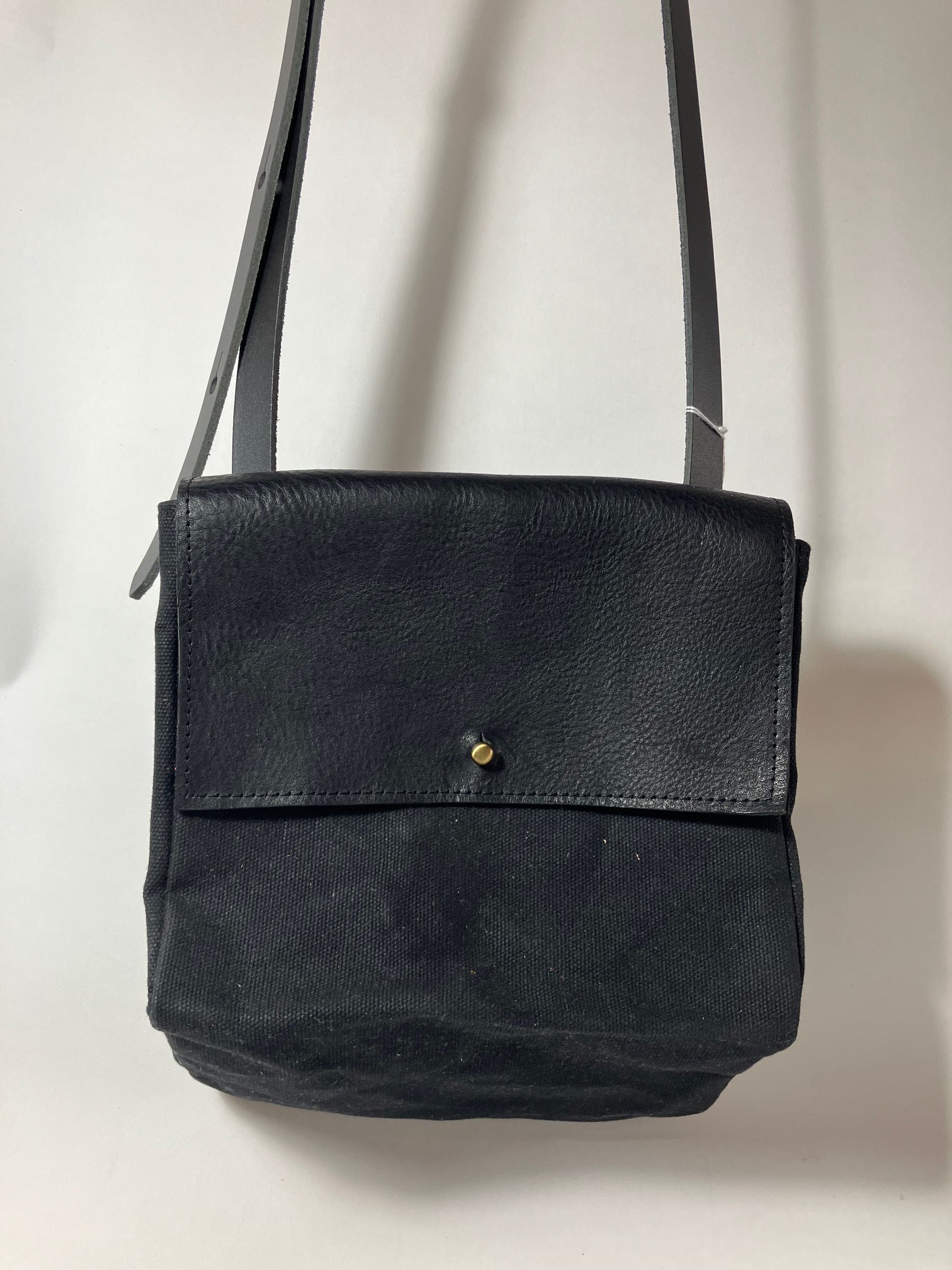 SAMPLE. PROTOTYPE black leather and waxed canvas Triangular handbag TRIANGOLO