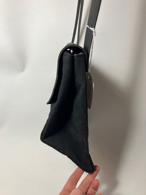 SAMPLE. PROTOTYPE black leather and waxed canvas Triangular handbag TRIANGOLO