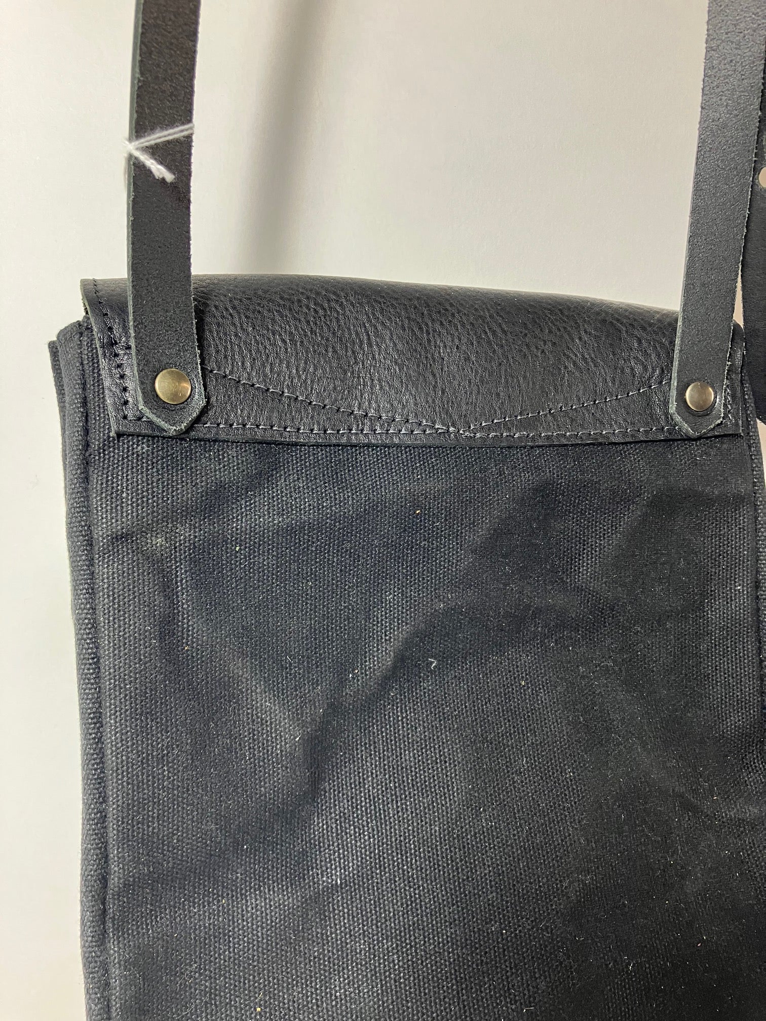 SAMPLE. PROTOTYPE black leather and waxed canvas Triangular handbag TRIANGOLO