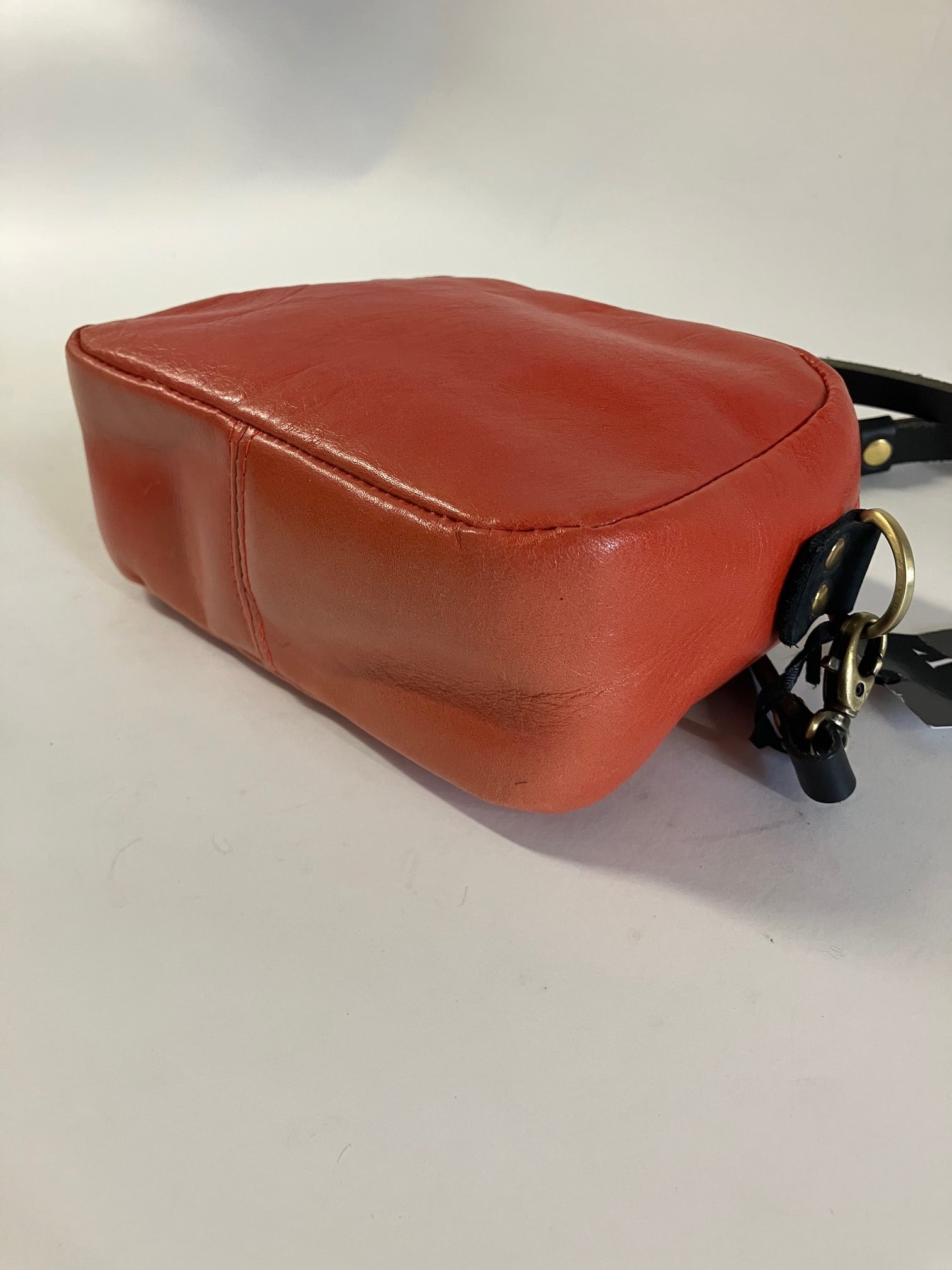 SAMPLE Leather crossbody bag and brass charm red color