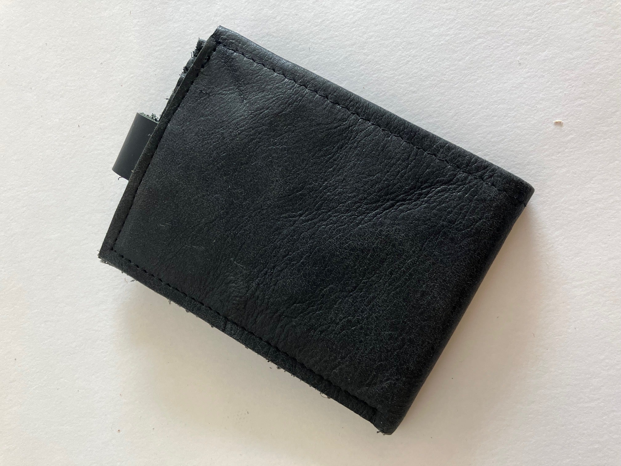 SAMPLE. Minimalist bifold black leather wallet