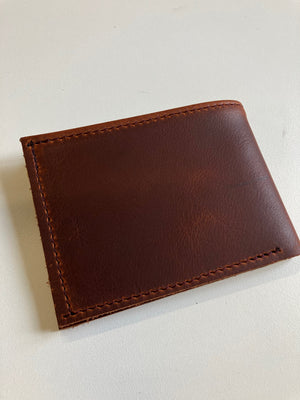 SAMPLE. Minimalist bifold cognac brown leather wallet. handmade in Canada