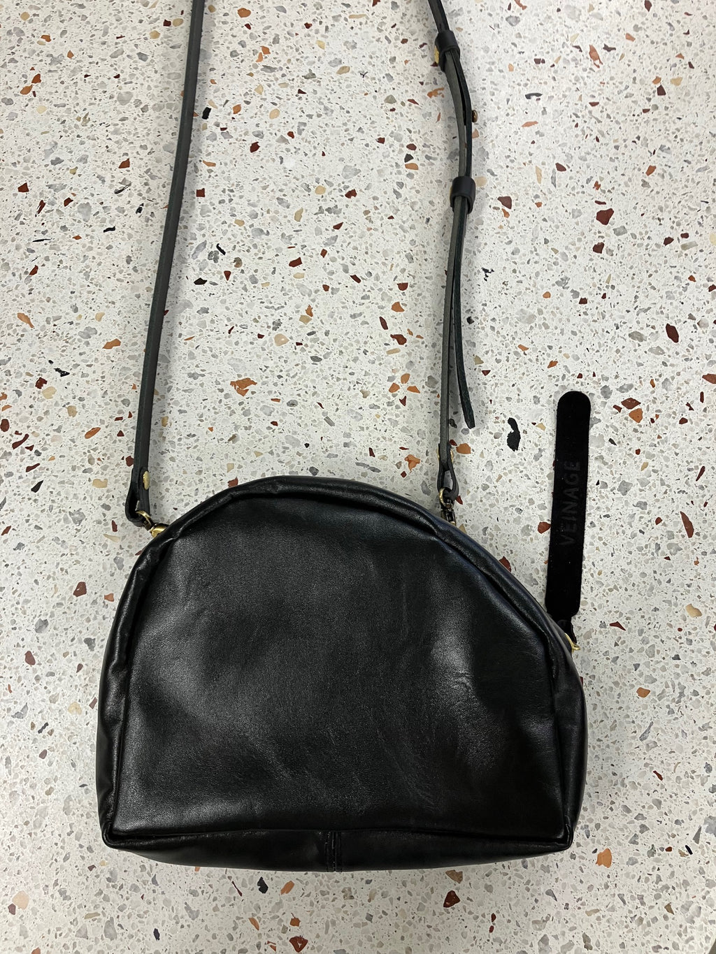 SAMPLE Leather shoulder bag with charm MERINGUE model