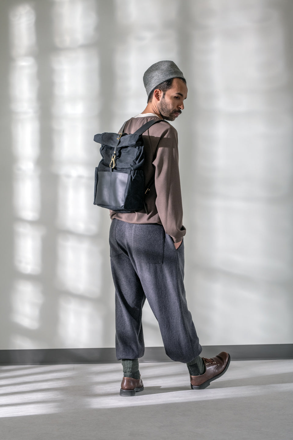 Roll top leather and waxed coton backpack DE LORIMIER model