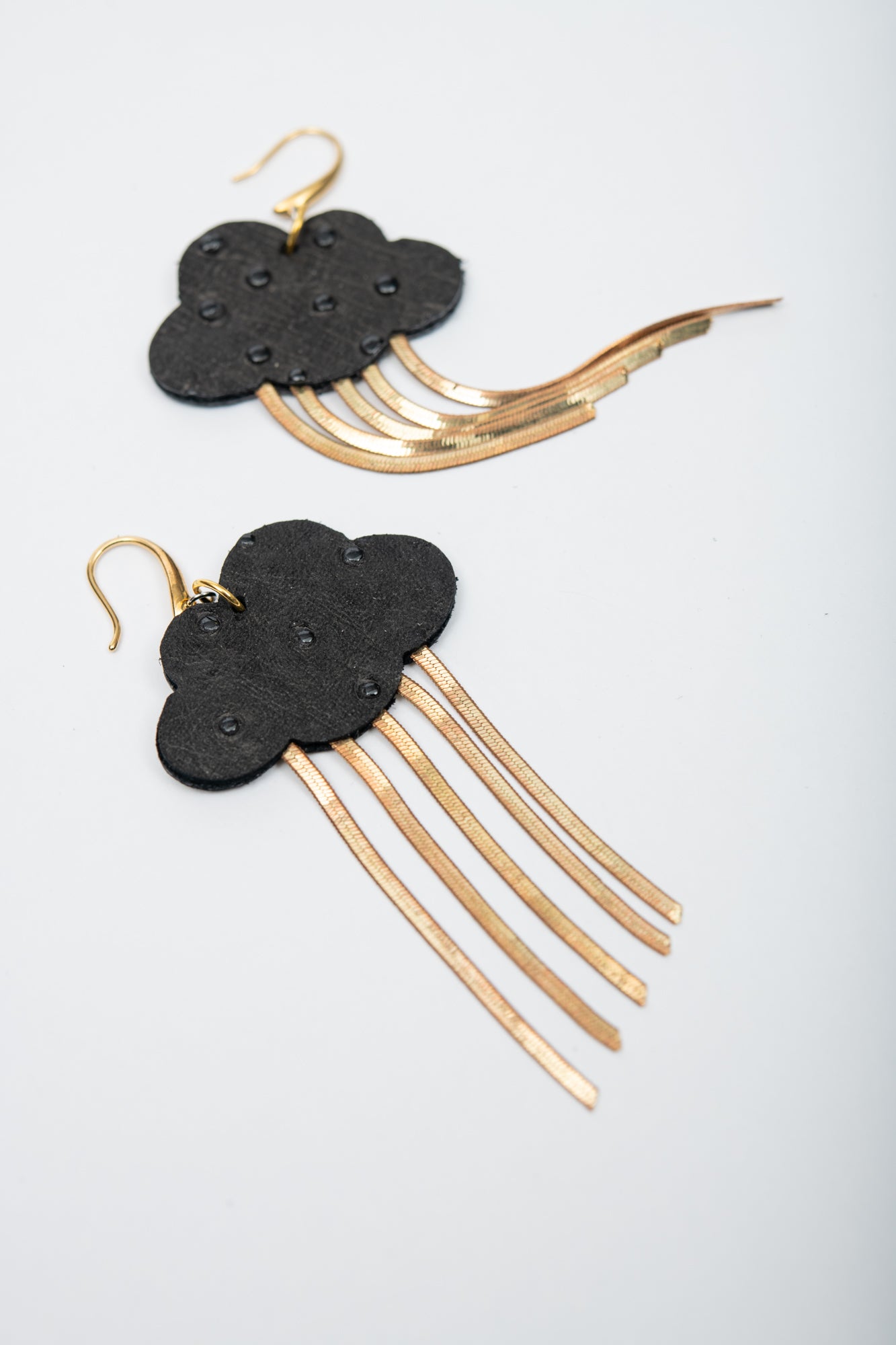 Large statement leather earrings NUAGE model, handmade by Veinage in Montreal Canada
