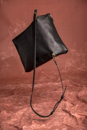 Leather clutch bag with crossbody strap BORDEAUX made to order by Veinage, handmade in Montreal Canada