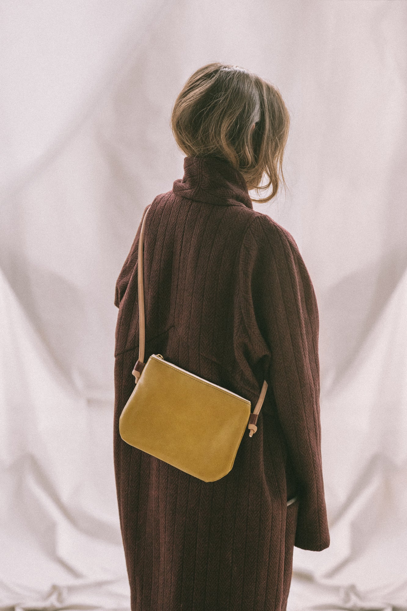 Mid-season jacket and minimalist small shoulder pouch in leather Venice model, Veinage handmade in Montreal, Canada