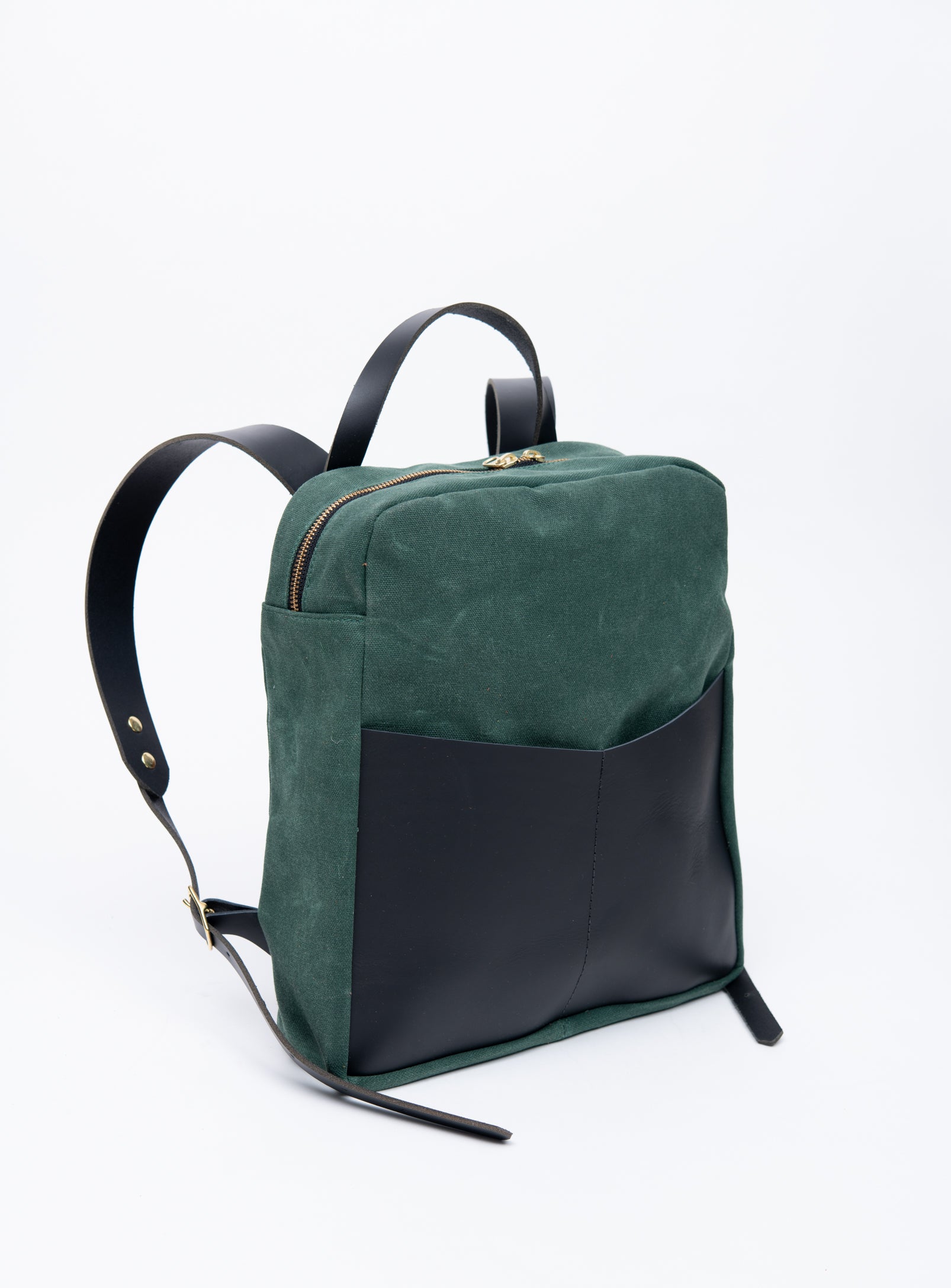Veinage Gilford black leather and army green waxed canvas backpack, handmade in Montreal Canada