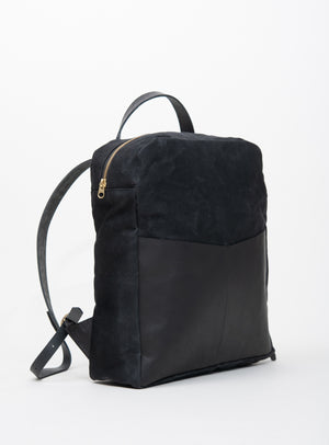 Veinage Gilford black leather and army green waxed canvas backpack, handmade in Montreal Canada